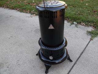 Vintage Perfection Kerosene - Burning Portable 525m Heater photo