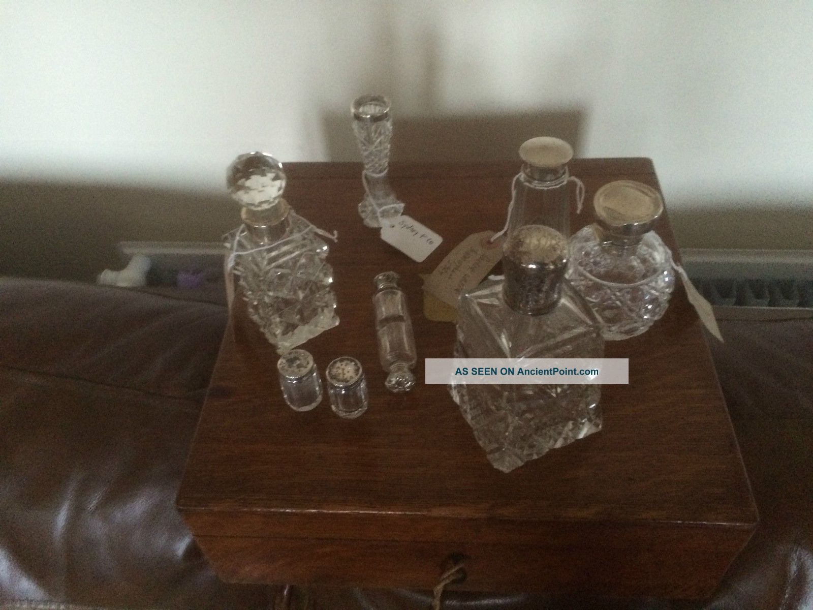Lovely Selection Of Glass Perfume Bottles Etc With Silver Collars Or Lids Bottles photo