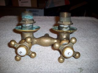 Vintage Brass Water Faucet From Cast Iron Bath Tub photo