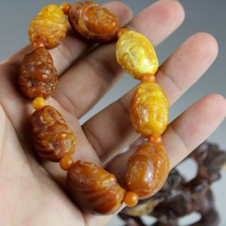 Chinese Hand - Carved Buddha Head Artificial Beeswax Bracelets 1993 photo