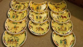 Crescent Shaped Plates Depicting The Bayuex Tapestry And The Battle Of Hastings photo