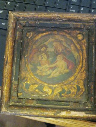 Antique Painting Or Print? On An Antique Wood Frame Embelished With Gilding photo