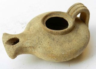 Biblical Jerusalem Oil Lamp Holy Land Ancient Antique Roman Black Clay Pottery. photo