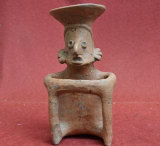 Pre Columbian Statue Of A Sitting Man With Bowl Nayarit Culture,  Mexico photo