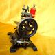 Antique Victorian Cast Iron Small Toy Sewing Machine With Golden Decorations. Sewing Machines photo 2