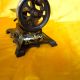 Antique Victorian Cast Iron Small Toy Sewing Machine With Golden Decorations. Sewing Machines photo 3