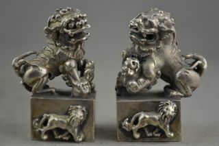 China Collectible Decorate Handwork Old Miao Silver Carving Kylin Pair Statue photo