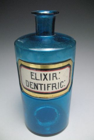 Antique Blown Turquoise Apothecary Bottle Elixir : Dentrific.  No Stopper photo