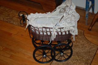 Victorian Style Brown Wicker Doll Buggy/ Carriage. photo