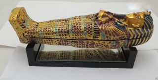 Egyptian Pharaoh King Tut Coffin With Mummy Statue Figurine On Mirror photo