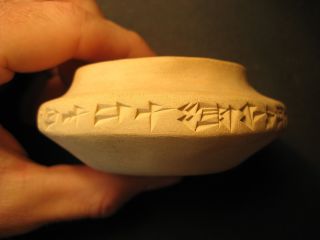 Terracota Candle Holder With Cuneiform Inscription photo