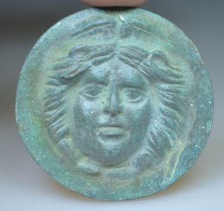 Roman Bronze Roundel Depicting Gorgon Medusa photo