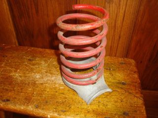 Red Coil Spring Industrial Machine Age Steampunk Metal Art A photo