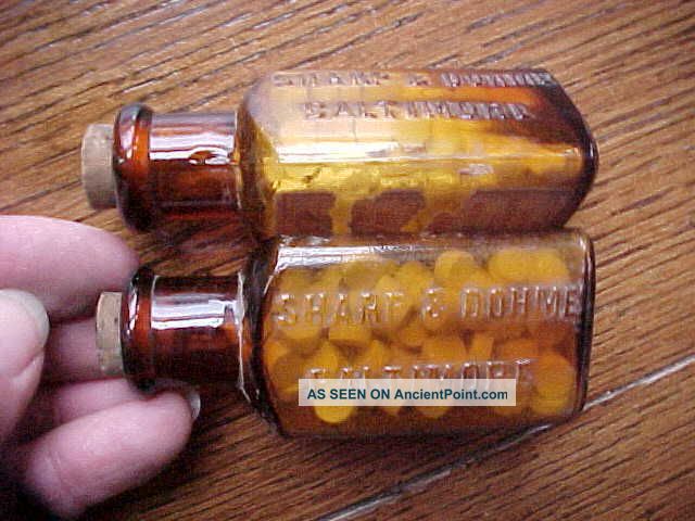 2 Empty 1920s Poison Strychnine Bottles Sharp & Dohme Medicine Embossed Triangle Bottles & Jars photo