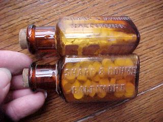 2 Empty 1920s Poison Strychnine Bottles Sharp & Dohme Medicine Embossed Triangle photo