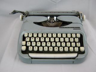 Vintage Nippo Elgin Collegiate Portable Typewriter Powder Blue Gull Wing Covers photo
