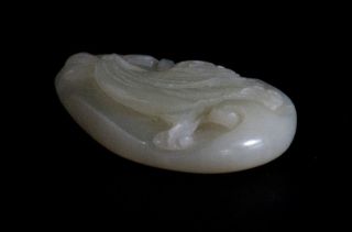 A Chinese Nephrite Jade Amulet Depicting A Rooster photo