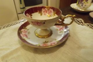 Cup And Saucer Larger Size Pink And Burgandy photo