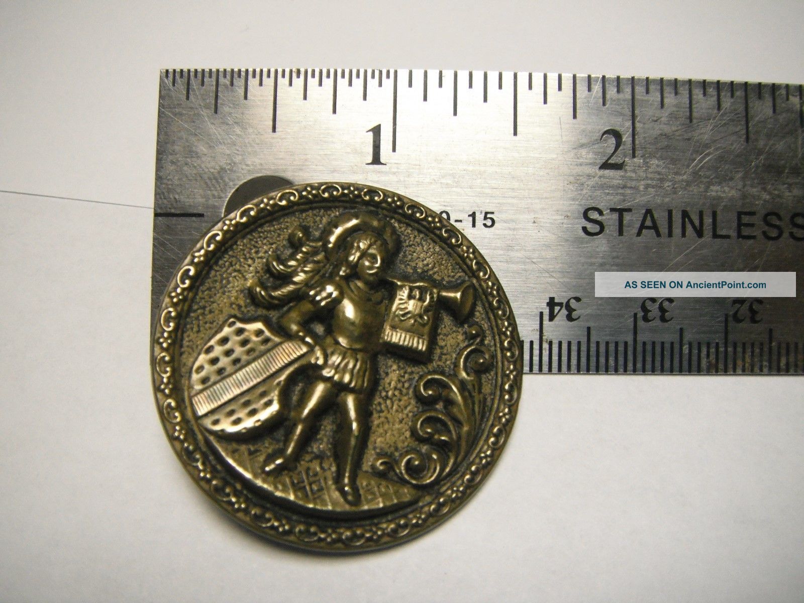 Antique Brass Picture Button - Man With Trumpet And Shield Buttons photo