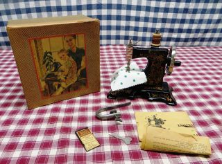 786 Mueller’s Early 1900’s German Decorative Childs Sewing Machine photo