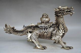 Exquisite Workmanship Silver Copper Handwork Carved Dragon Statue. photo