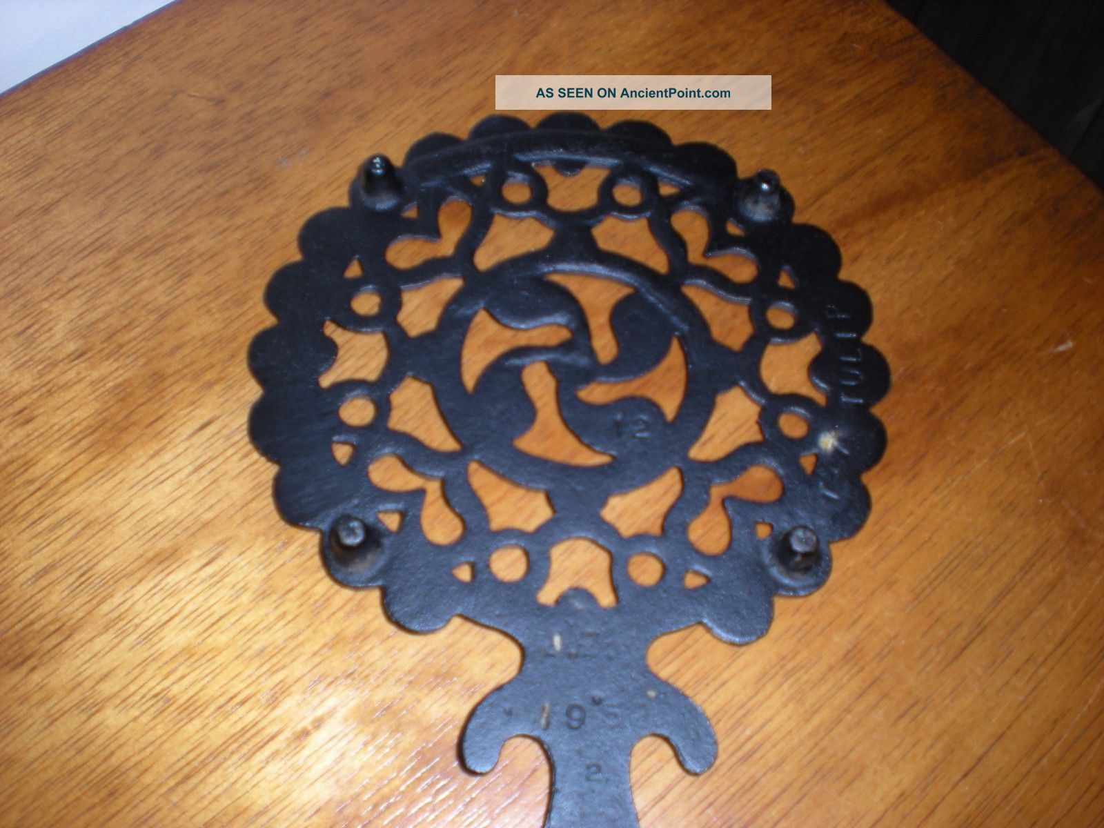 Vintage Cast Iron Tulip Trivet Trivets photo