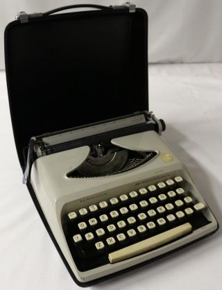 Vintage Remington Streamliner Typewriter With Hard Black Shell Case photo