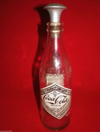 1974 75th Anniversary Coca Cola Bottle & Old Aluminum Ironing Clothes Sprinkler photo