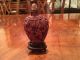 A Chinese Qing Dynasty Carved Cinnabar Snuff Bottle With Stand. Buddha photo 1