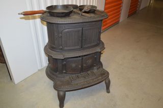 Rare Antique Ornate Cast Iron Wood Burning Parlor Stove With Accessories. photo