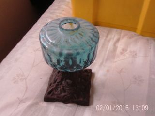 Oil Lamp Cast Iron Base And Blue Glass Font photo