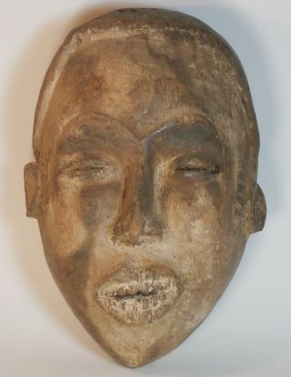 Old Igbo Maiden Spirit Mask (agbogho Mmuo) Igboland,  Nigeria photo