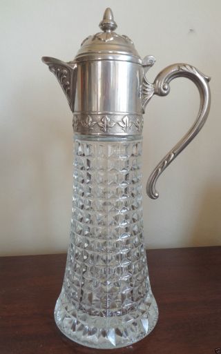 Glass Claret Jug With White Metal Mounts photo