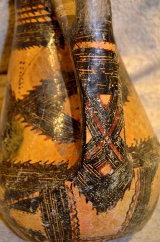 Ancient Pottery Pot With Painted Designs photo