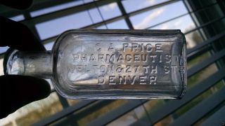Blown Denver,  Colorado C.  A.  Price Pharmaceutist Welton & 27th Sts Denver Bottle photo