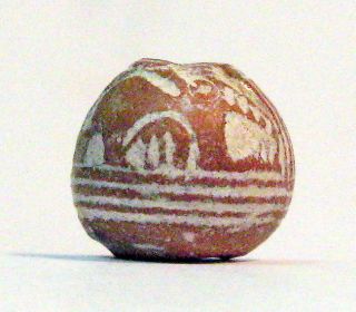 Pre - Columbian Brown Pointed Head Animal Bead.  Guaranteed Authentic. photo