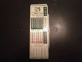 Vintage Omega Pocket Adding Machine Calculator 9 Digit 1964 photo