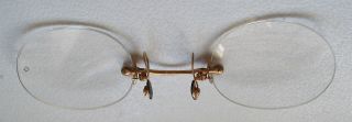 A Antique Rimless Yellow Metal Pince Nez Spectacles photo