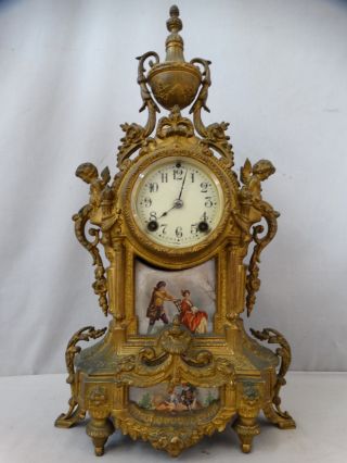 Antique French Rococo Figural Winged Putt Porcelain Bronzed Spelter Mantel Clock photo
