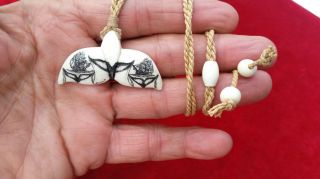 Nautical Scrimshaw,  Crafted Bone Whale Tail Design,  Pendant/necklace photo