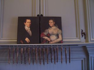 Early Reproduction Portraits On Canvas.  Man And Women photo
