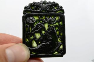 China ' S Carving Natural Jade Nephrite Black Jade Pendant Fish photo