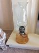 Vintage Glass Oil Lamp With Clear Glass Chimney And Amber Glass Base 20th Century photo 1
