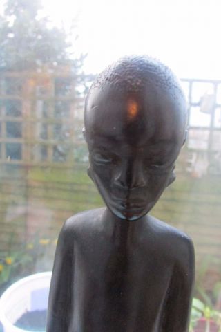 Vintage Dark Hardwood Wooden Statue Carved Figure Of African Tribal Man photo