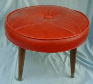 Vintage Mid Century Modern Orange Vinyl Round Ottoman Foot Stool W/ Tapered Legs photo