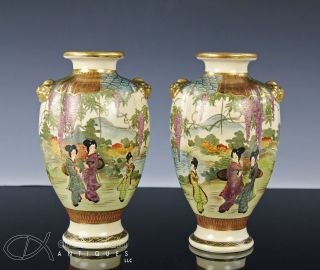 Old Japanese Satsuma Pottery Vases With Figures In Landscape photo