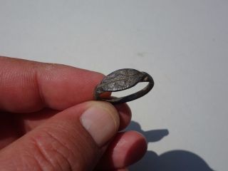 Ancient Roman Engraved Ring Displayed Snakes photo