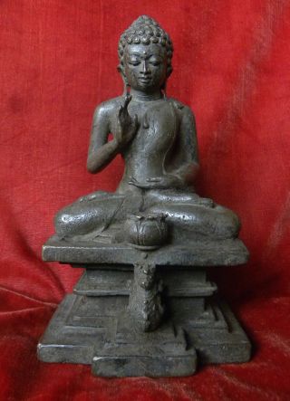 Highly Rare Javanese Silver Bronze Of The Buddha Resisting Mara photo