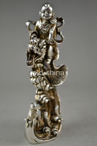 China Collectible Decor Handwork Old Tibet Silver Child Ride Dragon Fish Statue photo
