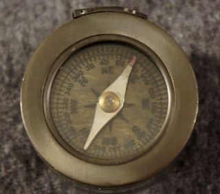 Vintage Compass With Magnifying Glass photo